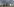 Das Kanzleramt in Berlin unter dunklen Wolken